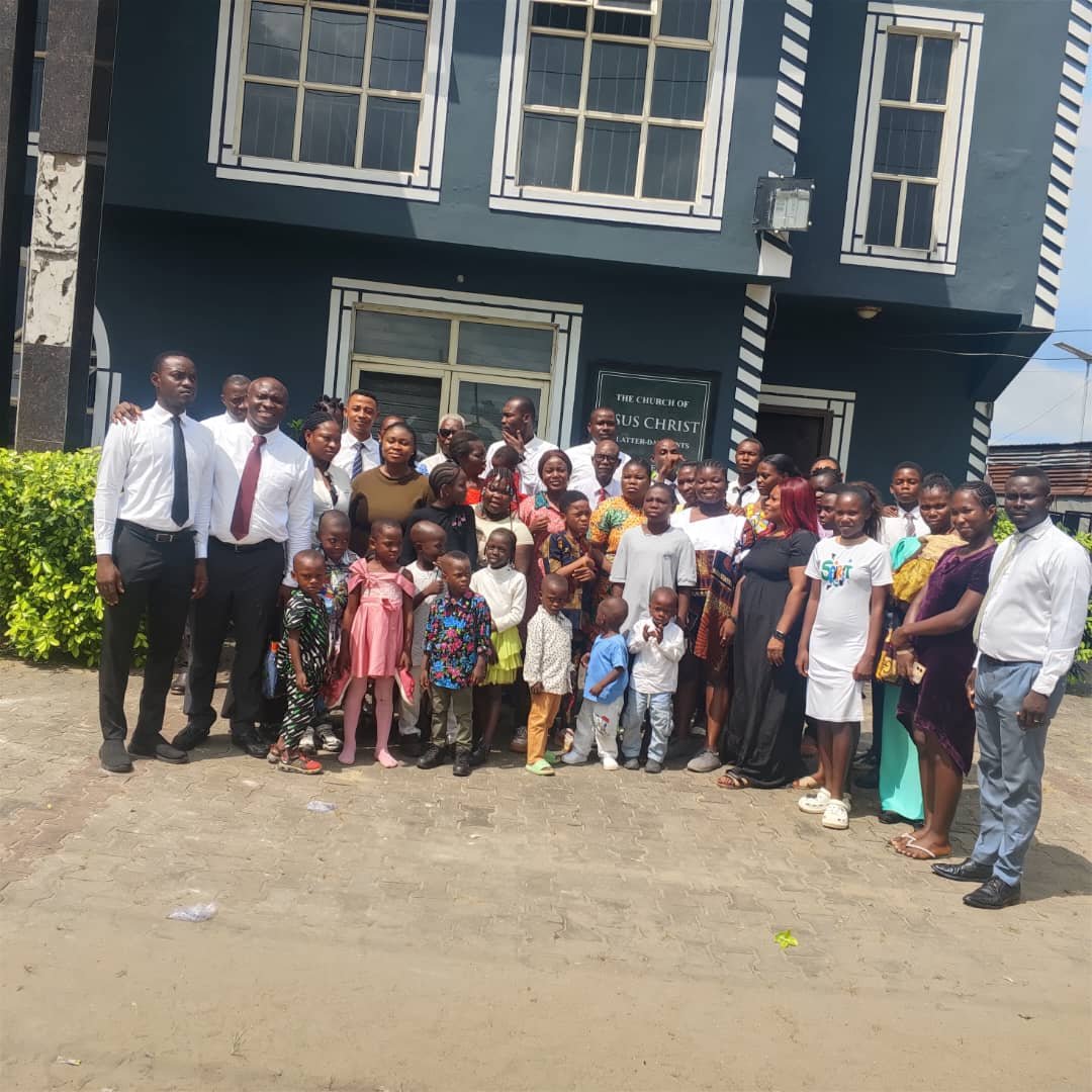 Another group of church members gathered outside the chapel