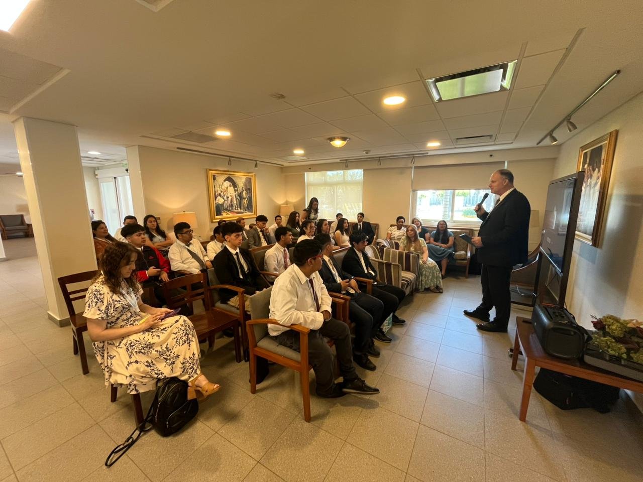 A devotional meeting led by an Area Seventy with members of the stake