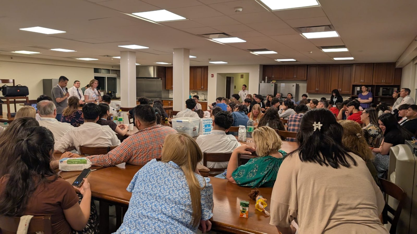 Members sharing heartfelt testimonies during a devotional meeting